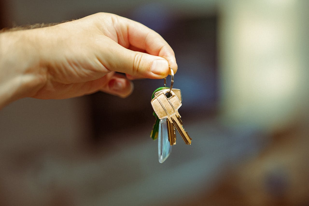 New homeowner receiving keys to their property